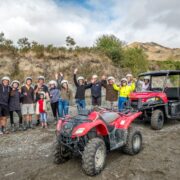 Group Enjoying Hanmer Springs Attractions Quad Bike And Buggy Tour